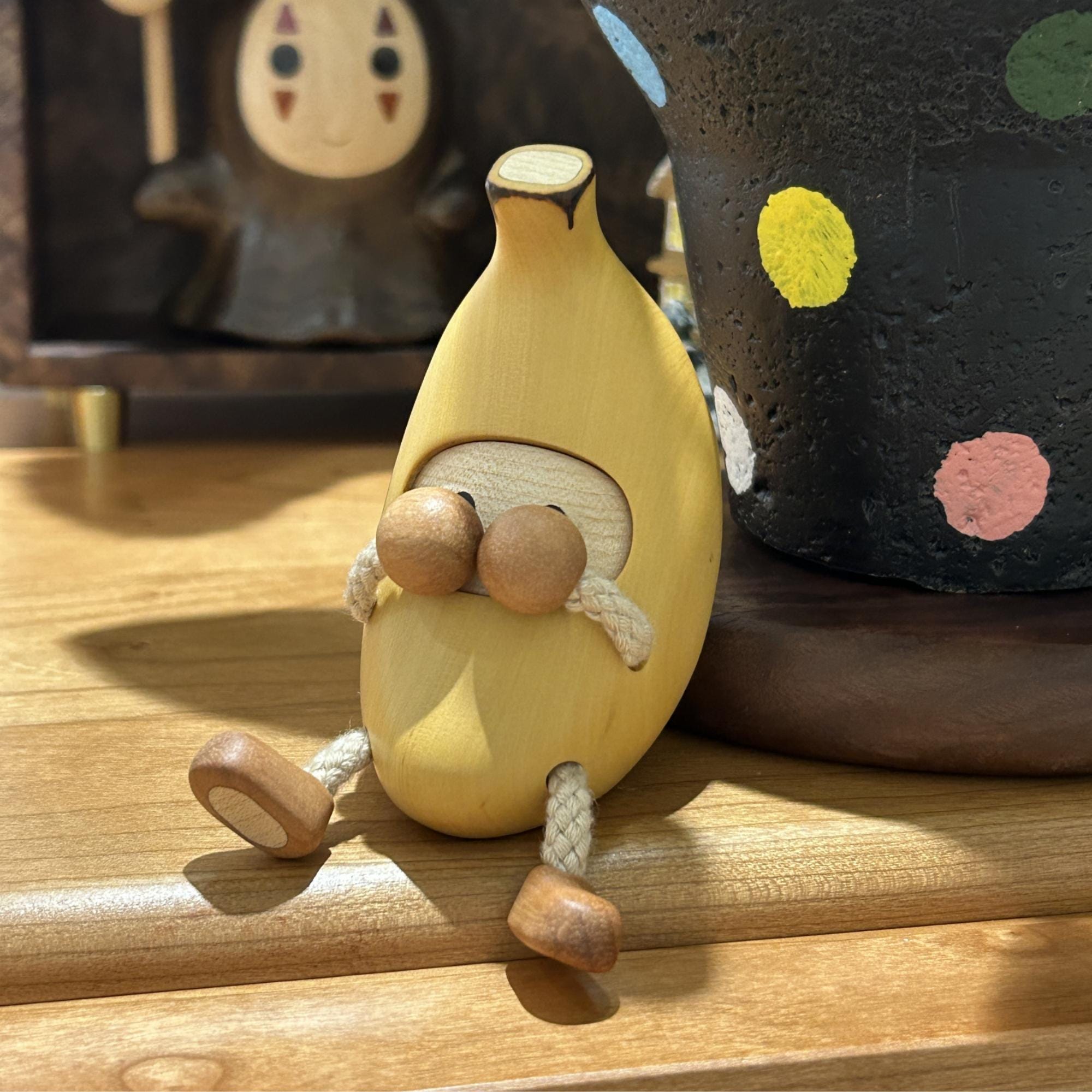 Handmade wooden banana man, a unique gift idea for an anniversary.