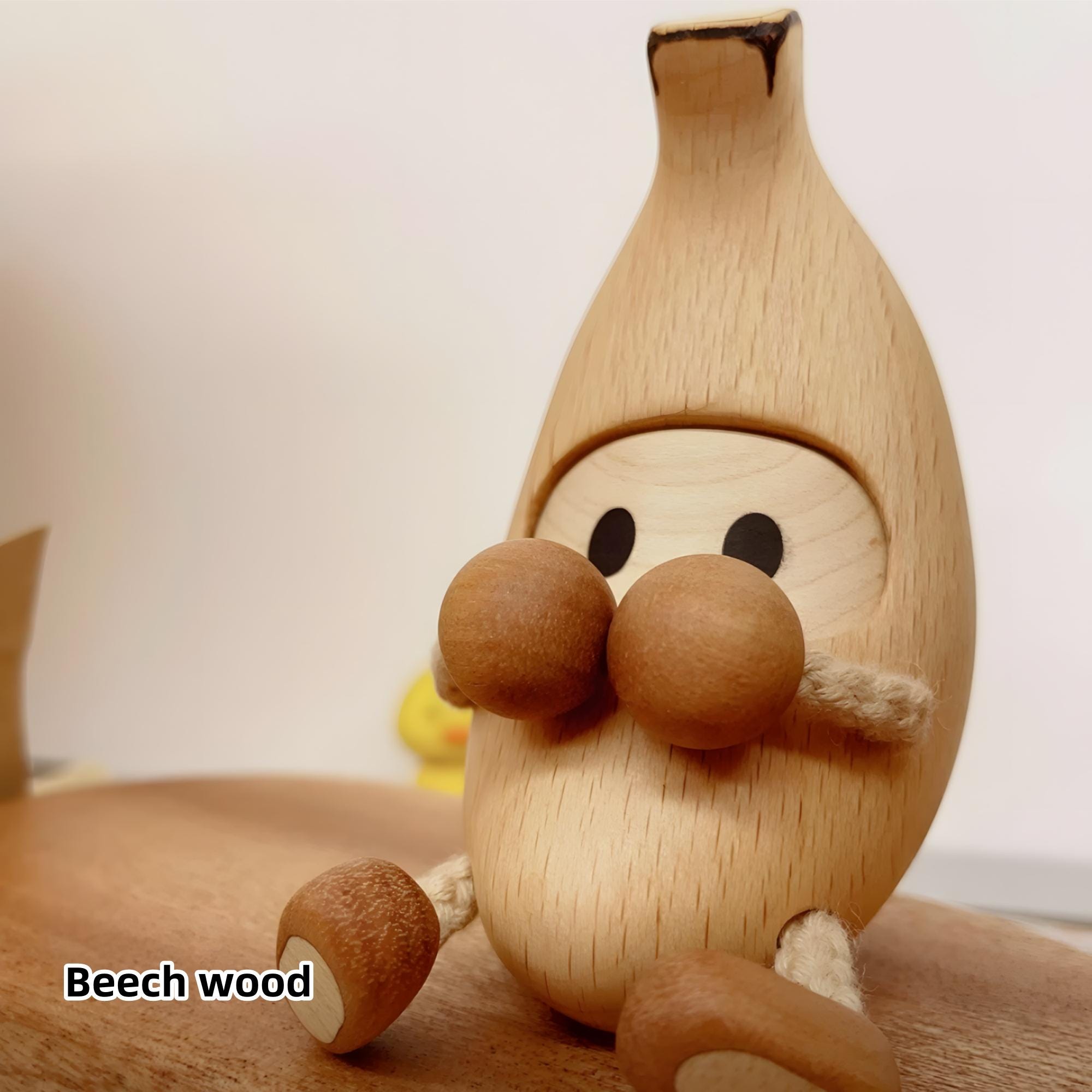 Handmade wooden banana man, a unique gift idea for an anniversary.