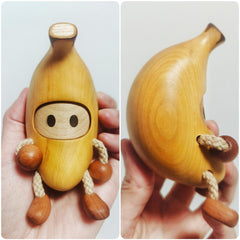 Handmade wooden banana man, a unique gift idea for an anniversary.